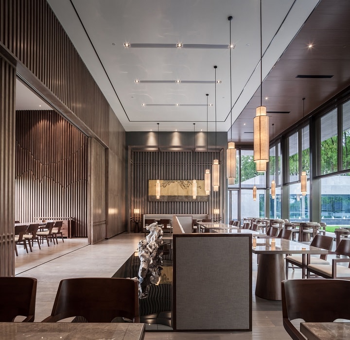 休閑茶樓裝修效果圖—現代門(mén)樓，曲折圓潤的中式藝術(shù)裝置